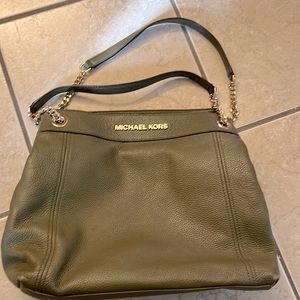 Michael Kors Olive Purse with gold chain handles.